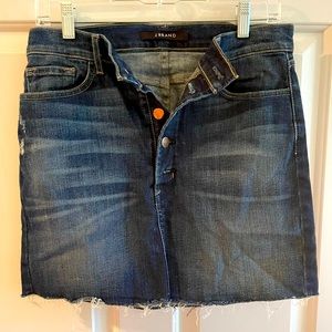 Mini blue Jean skirt with frayed ends